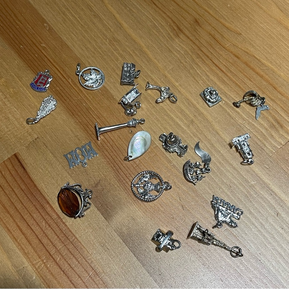 19 Assorted Sterling Silver Charm Collection